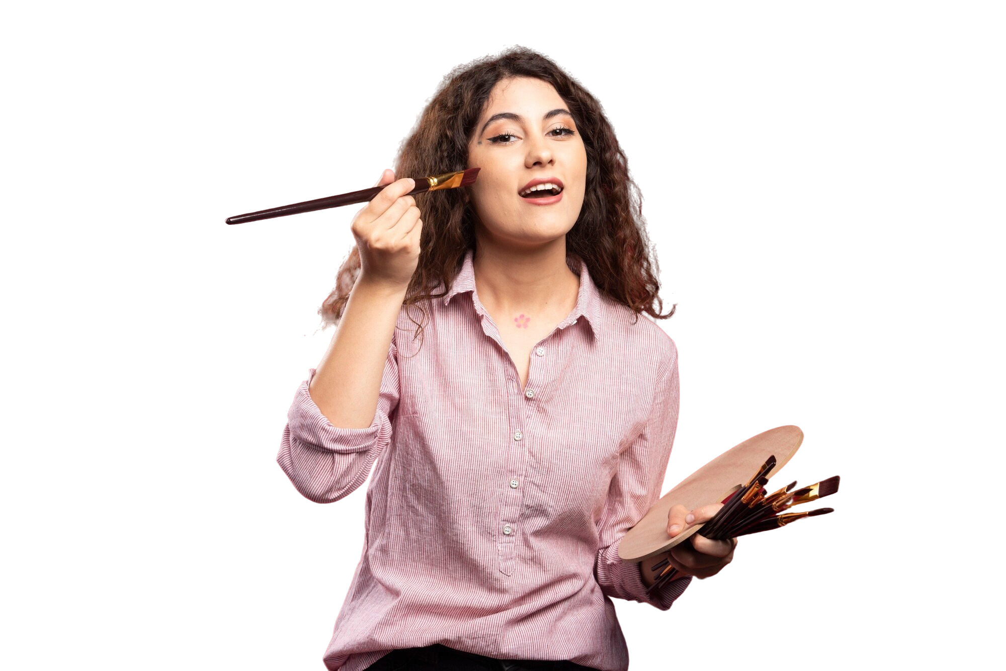 curly artist looking applying her blush with paintbrush